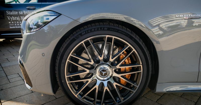 close up of mercedes benz amg wheel in urban setting